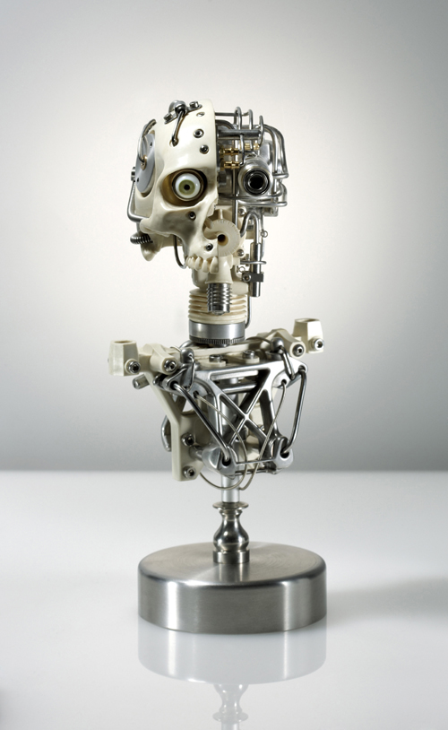 MINIATURE ROBOTIC CYBORG SKULL TITLED CYNTHETIC CROSS-SECTION BY ARTIST CHRISTOPHER CONTE